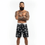 THIGHBRUSH® - LOGO BLAST - Men's Board Shorts - Black