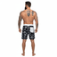 THIGHBRUSH® - LOGO BLAST - Men's Board Shorts - Black