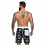 THIGHBRUSH® - LOGO BLAST - Men's Board Shorts - Black